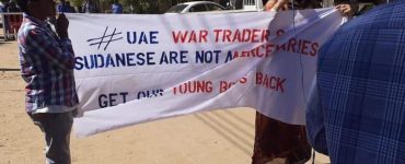 Sudanese protesters in front of the UAE embassy in Khartoum on Sunday (Twitter/@salma1siddig)